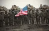 Soldiers from the 2nd Battalion, 5th Cavalry Regiment, 1st Armored Brigade Combat Team, 1st Cavalry Division, represent the United States during the closing ceremony of joint-force exercise J