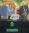 Submitted photo Surrounded by her family, Colony senior Allie
Grazulis, center, signed a National Letter of Intent to play
basketball at Colorado School of Mines on Thursday. Grazulis had
the