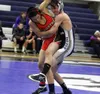 Redington's Jordan Morganflash battles Houston's Jens Knutson during the 2016 season. Morganflash is part of an improved Redington squad that has more than double the number of wrestlers than