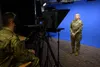 U.S. Air Force Col. Kirsten Aguilar, Joint Base Elmendorf-Richardson and 673d Air Base Wing commander, records a public service announcement in the 673d ABW Public Affairs studio at JBER, Ala