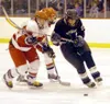 Colony forward Chris Arentz tries to drive the puck past a pair
of Wasilla defensemen during the Knights' 4-1 loss to Wasilla on
Saturday. Photo by JEREMIAH BARTZ/ Frontiersman.