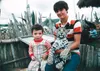 Erick Cordero, left, and Victor Hugo Cordero, right, pose in an undated family photo taken with a leopard cub at Africam Safari zoological park attraction in Puebla Mexico. The brothers grew 