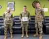 Airman 1st Class Kramer, a 673d Logistics Readiness Squadron Individual Protective Equipment apprentice, is recognized as the Arctic Warrior of the Week by U.S. Air Force Col. Kirsten Aguilar