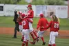 Wasilla’s Byson Malave lifts teammate Jacob Gilbert into the air after a 13-1 win over Chugiak in the ASAA/First National Bank State Baseball Championships semifinals Friday at Mulcahy Stadiu