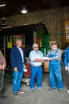 From left, Phil Homan, President and CEO of Loram Maintenance of Way, Inc., William Shell, President and CEO of Georgetown Rail Equipment Co., and Patrick Durand, President of Engine 557 Rest