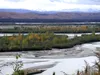 The mountains of the Alaska Range north of Anchorage are seen in September 2002 across from the Susitna River.  Courtesy of Dr. Igor Smolyar/National Oceanic and Atmospheric Administration