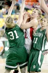 Wasilla's Jenna Johnson gets caught between Colony's Alex Coon
and Terra Gerrod during Friday's semi final match at the Alaska
state basketball championships. (ROBERT DeBERRY/Frontiersman)