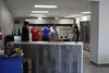 Burger Jim staff spend time remodeling after a May 28, 2018, fire that closed the Palmer area restaurant for more than a month. Burger Jim reopened July 5, 2018. Tim Rockey/Frontiersman
