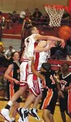 Wasilla center Ray Schafer rejects a West shot attempt in the
third quarter of Wednesday's game at Wasilla High School. The
Warriors' height advantage limited the Eagles to perimeter shooting