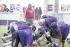 Arctic Predators assistant coach Kent Rilatos watches as the
Predators line up for a special teams drill during practice on
Wednesday. The team plays its first home game today. JEREMIAH
BARTZ