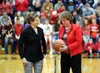 Wasilla High activities director Stacia Rustad presented WHS girls basketball head coach Jeannie Hebert-Truax with a basketball commemorating her 500th win as a head coach. Both will be induc