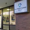 The entrance to the All Ways Caring office in Midtown Anchorage, with signs in the window encouraging job applicants, is seen on Nov. 22. Home care workers employed with All Ways Caring and w