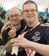Buddies Orion Walters and Kyle Berge show off their hard-earned mdeals during the 2015 Special Olympics Alaska Summer Games. JENNY WEAVER/For the Frontiersman