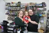 Game Theory owners Brandon and Amber Sumner with their son Miles. Jacob Mann/Frontiersman/