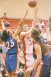 ROBERT DeBERRY/Frontiersman Wasilla forward Jillian Troisi gets
off a shot during the Warrior's game against the Anchorage
Christian Lions Saturday afternoon at Wasilla High School.