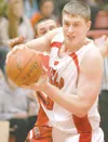 Wasilla forward John Knowles secures a rebound during the 2008
Northern Lights Conference Tournament at Palmer High School last
spring. This season Knowles is the tallest —at 6-foot-7 —on a W
