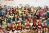 Students at Machetanz Elementary School crowd together for a photo with Alaska Rep. Jim Colver (R-Wasilla), Gov. Bill Walker, First Lady Donna Walker, and Rep. Cathy Tilton (R-Chugiak) Tuesda