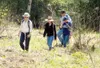 KARI SLEIGHT/Frontiersman Visitors to the restored Carle-Wagon
Trail make their way along the two-mile trail Saturday in the
Hatcher Pass area.