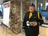 Frank Hartman, owner of Matanuska Music in Wasilla, stands at attention with his bugle during the Nov. 11 Veterans Day Reception at Mat-Su Regional Medical Center. Hartman played taps to conc
