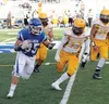 Palmer fullback Austin Farris breaks to the outside on a run during a 35-19 win over Lathrop Aug. 21, 2015, at Machetanz Field in Palmer. Farris returns as one of Palmer's top seniors on the 