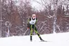 Colony High School's Dawson Knopp easily makes a deceptively fast corner just before the finish of the boys 5-kilometer classic race at Government Peak Saturday. Knopp came in first overall w