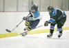 ROBERT DeBERRY/Frontiersman Alaska forward Matt Friese races
past Wenatchee’s Dustin McKellar for the puck during a recent
game.