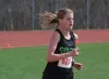 Colony's Jill Bowker leads the girls 3200 meter run at the Region III Track Championships at Homer High School on Friday, May 19, 2017. Stephen Nowers