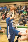 Palmer senior guard Adam Ramoth drives to the basket during the Northern Lights Conference Championships at Colony High. Ramoth capped his career with a 30-point effort Friday in a win over K