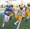 Palmer fullback Austin Farris breaks to the outside on a run during a 35-19 win over Lathrop Aug. 21 at Machetanz Field in Palmer. Courtesy of Bruce Eggleston/matsusports.net