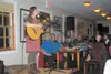 Emma Hill performs for the assembled members of the Palmer Arts
Council at Saturday's annual meeting at Rusty's at Dahlia Street.
In addition to musical performances, the event featured the s