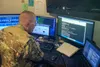 Army Maj. Jared Hrabak, a cyber officer with the Army Reserve’s Cyber Protection Team 185, uses a common network scanning tool called “masscan” to enumerate a network during his unit’s virtua