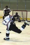 Palmer defenseman Travis Thornhill takes a shot from the outside
in the first period of Thursday's game against Nikiski. Photo by
TIM BRODT/Frontiersman.