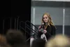 Wasilla High School student Shyanne Massie introduces the panelists for the Friday evening discussion using notes on her phone at the Alaska Association of Student Governments fall conference