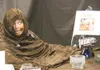 Lisa Hansel is Gloppy in an animated version of the children's
game "Candlyland" at Matanuska Electric Association's Wasilla
office. Gloppy is a chocolate swamp monster. (GREG
JOHNSON/Frontie