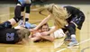 Palmer senior Julia Benshetler (23) and junior Abriana Busbey try to pull the ball away from Colony senior Ella Smith during a Palmer win over the Knights. Courtesy of Bruce Eggleston/matsusp