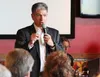 Anchorage Mayor Ethan Berkowitz speaks to the Chugiak-Eagle River Chamber of Commerce June 7. MATT HICKMAN/The Eagle
