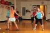 Annie Prevost, left, leads an OULA dance fitness class at the MTA Sports Center June 25. OULA is a new, choreography-based dance class focused on getting people to feel comfortable while danc