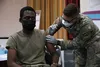 U.S. Army Maj. Bielosa Aworh, assigned to the 24th Theater Public Affairs Support Element, receives the COVID-19 vaccination at Stayton Theater, at Fort Bliss, Texas, Feb. 5, 2021. Medical pe