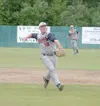 Alaska third baseman Mike Dotson makes the throw to first during
the Road Warrriors’ 12-11 win over Service, on the third day of the
Todd Ryan Memorial tournament at McManus Field. Dotson als