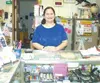 Katina Stewart has helped her father run Alaska Best Pawn for
several years and says she has learned a lot about everything from
guns to tools along the way. Photo by EOWYN LeMAY IVEY/Frontie