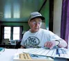 Long-time Palmer resident Wayne Bouwens working in the Colony
House Museum.WILLIAM WOODY/Frontiersman