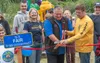 Susitna Rotary President Kim Erickson, Houston Mayor Carter Cole, and Susitna Rotary Jack Timm, who has “put a gazillion hours into this,” cut the ribbon on the new playground for the Little 