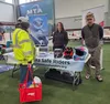 A person attending visits the Alaska Safe Riders booth. Courtesy of Debra McGhan
