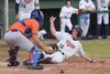 Twins pitcher Mose Hayes (14) slides safely into home ahead of the tag of Palmer catcher Brady Shults Tuesday, July 16, 2019, at Coral Seymour Memorial Park in Kenai, Alaska. Joey Klecka/Peni