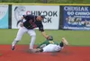 Mat-Su Miners infielder Brandon Chinea slides underneath the teag of Chugiak-Eagle RIver's Alex Schmitz during a recent meeting. Jeremiah Bartz/Frontiersman