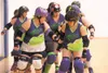 The Denali Destroyer Dolls roller derby team keeps a tight
formation while skating around the Chris Stringer Memorial Gym
during a recent practice. ROBERT DeBERRY/Frontiersman