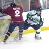 Alaska forward Connor Wright, right, tries to poke the puck free
against Fairbanks last week. Wright was recently acquired in a
trade with Kenai River. (ROBERT DEBERRY/Frontiersman)