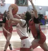 Bisbee senior Kitana Rogers attempts to get her shot off in the Pumas game with St. Augustine Thursday night in Bisbee. Bruce Whetten Herald/Review