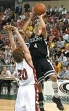 Colony senior Justin Schwartzbauer puts up a shot during the
second quarter of the Knights' 42-41 win over the Wasilla Warriors.
JEREMIAH BARTZ/ Frontiersman
