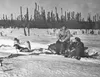 Gleo Huyck and Dan Seavey clear brush along the Iditarod Trail many years ago. The 2015 Iditarod Trail Sled Dog Race ceremonial start begins at 10 a.m., March 7 in Anchorage. The restart is M